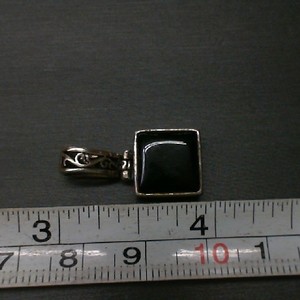 STERLING SILVER AND BLACK ONYX PENDANT