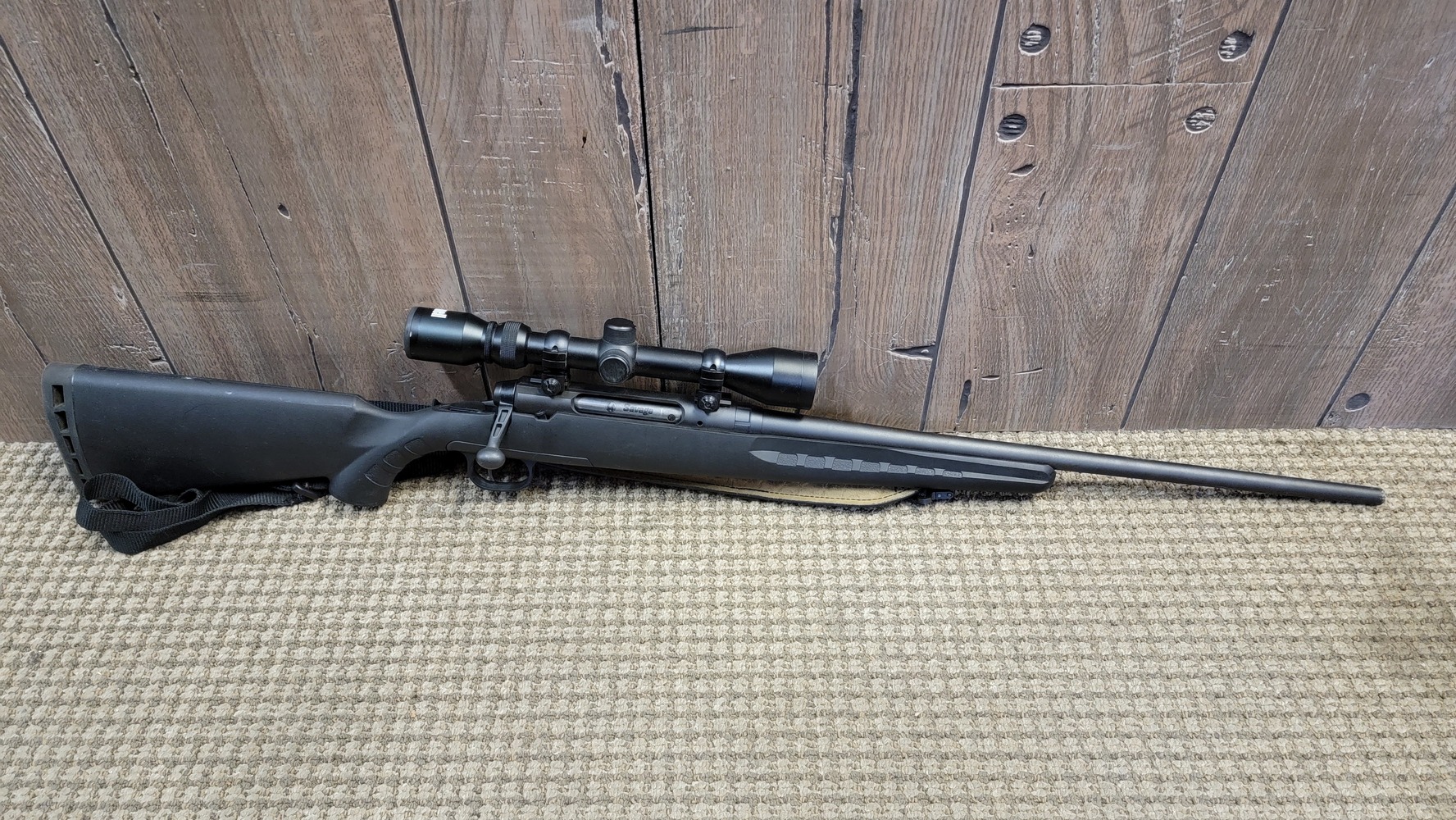 Savage Axis (Black) w/ Bushnell Scope Attached