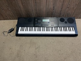 Casio WK-6600 76-Key Portable Keyboard w/ Power Cable, Sheet Stand, & Manual