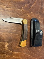Buck 112 Folding Knife in Leather Case