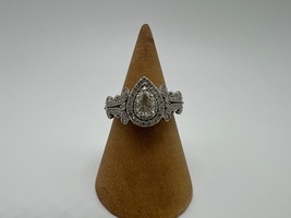 14kt Ring w/ .50 Pear Diamond on Top & Nineteen .03 Diamonds Surrounding