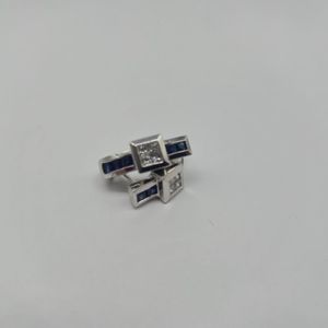 14K WHITE GOLD EARRINGS WITH FOUR PRINCESS CUT DIAMONDS AND SARPHIRE BAGGETS IN 