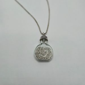STERLING SILVER NECKLACE WITH SILVER IN SMALL JAR 