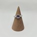 10K YELLOW GOLD RING WITH PURPLE CENTER STONE
