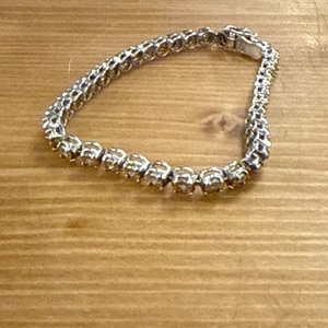 Sterling silver bracelet W/ 40 SMALL STONES 