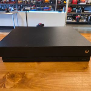 XBOX ONE X WITH ONE CONTROLLER AND CABLES 