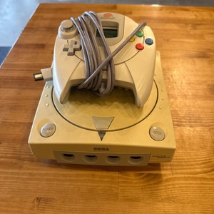 Sega Dreamcast w/ 1 controller, power and A/V Cord.