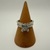 7.10gms Ring 14K WHITE GOLD RING WITH FOUR .20 PRINCESS CENTER DIAMONDS 