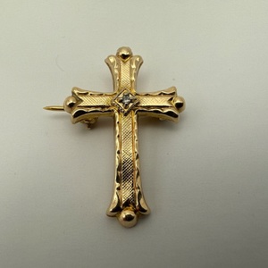 14kt 1.50gms Other 14k y/g cross w/ .03 center diamond 