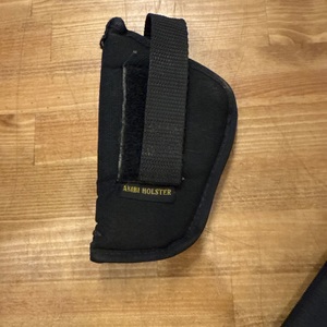  HOLSTERS, BELTS ETC