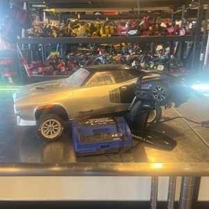 Traxxas / Baja with battery, charger and remote control.