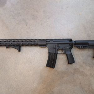 RADICAL RF-15 WITH SEEKINS DNA CHARGING HANDLE, AND ANGLE GRIP