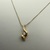 1.50gms 14K NECKLACE WITH A .10 DIA PENDENT 
