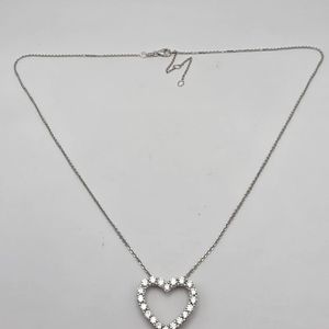 14K WHITE GOLD NECKLACE WITH HEART PENDANT WITH 20 .05 DIA SURROUNDING 3.6G 16"