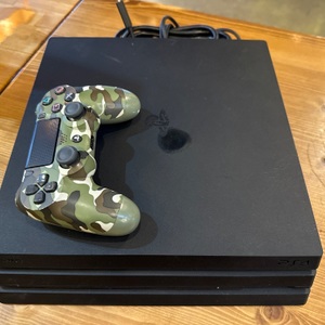 Ps4 pro slight burn damage on top with one camo controller