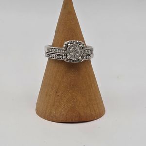 silver ring with dia chips on face and side size 7-1/4