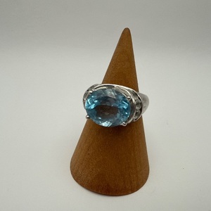 size 7 Silver ring 0.925% Ring 8.3 GRAMS WITH BLUE STONE 