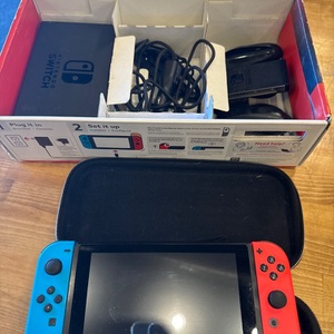 NINTENDO SWITCH WITH CAR CHARGER