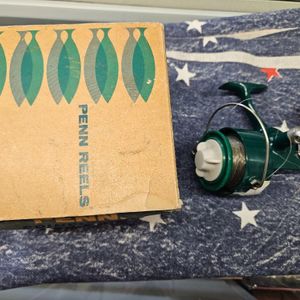 Vintage Penn 710 Spinning Reel with box and paperwork