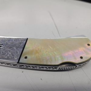 AA SANDERS FOLDER ABALONE SCALED ENGRAVED BOLSTERS 