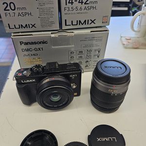 PANASONIC DMC-GX1 WITH 2 LENSES AND BOXES AND PAPERWORK