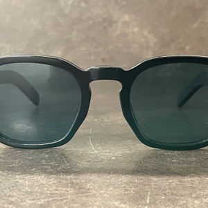 Prada APR A16S Men's Sunglasses Black Frame Green Polarized Lenses