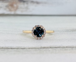 0.14ctw Diamond and London Blue Topaz Ring 14kr