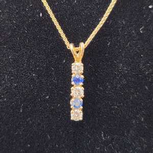 Pendent with 2 Blue Stones and 3 Diamonds on a Gold Chain