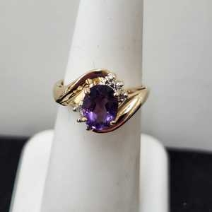 Purple Oval Stone Ring with diamonds