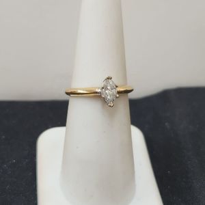 Approx. 1/2 ct marquise shaped diamond set in 14KT Gold