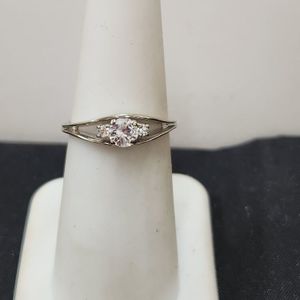 Three diamonds set in 14KT White Gold, (approx. 1/2 cttw)
