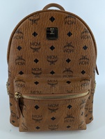 MCM Stark Side Studs Backpack in Visetos with leather and studded details.