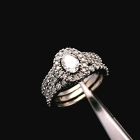 14KT White Gold .46ct GIA Oval Diamond Ring w/ ¾cttw Sides – Size 5 – 7.15g