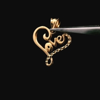  18KT Yellow Gold 0.60dwt “LOVE” Heart Pendant/Charm