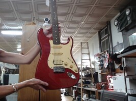 Fender SQUIRE Stratocaster Elec Guitar. Red Body/White Guard.
