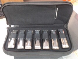 7 Hohner Harmonicas with case 
