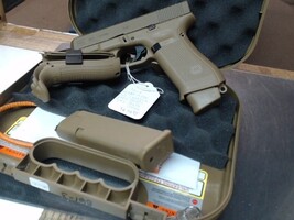 Glock 19X FDE. Gen 5 w/ two mags and Changeable backstraps.