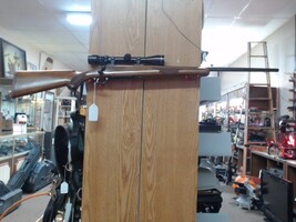 Ruger M77. 30-06 Walnut Stock with Tasco 3-9x40