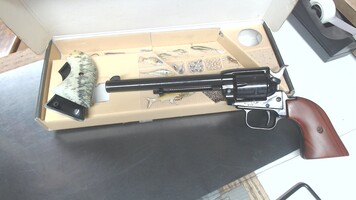 Heritage Model: Rough Rider Revolver 22 w/ 6 1/2" BBL and Extra Grips 