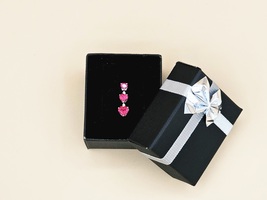 10kt Charm W/ Red Heart Shaped Stones