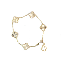 Ladies 14K yellow gold cable link bracelet with Diamond Cut Clover Charms.