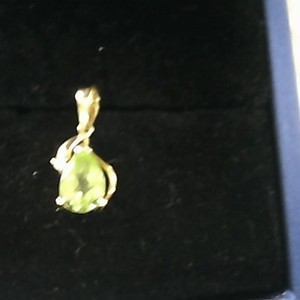 14k .75g peridot/dia pendant  