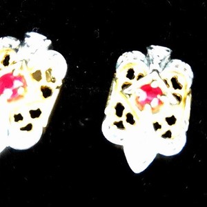 14k dia ruby 4.86g earrings