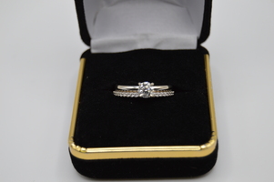  14kt White Gold Wedding set.  1/2ct Center with attached Diamond Band. $1499.00